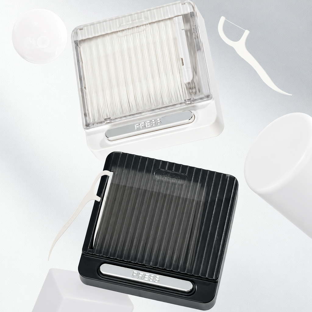 Automatic dental floss case in black and white