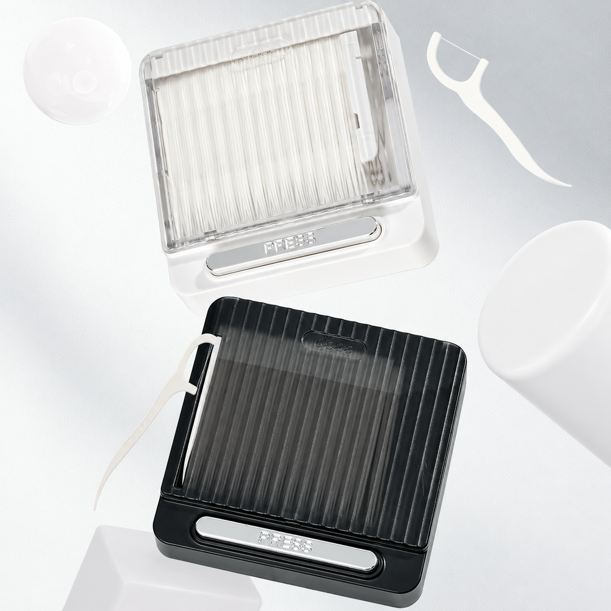 Automatic dental floss case in black and white